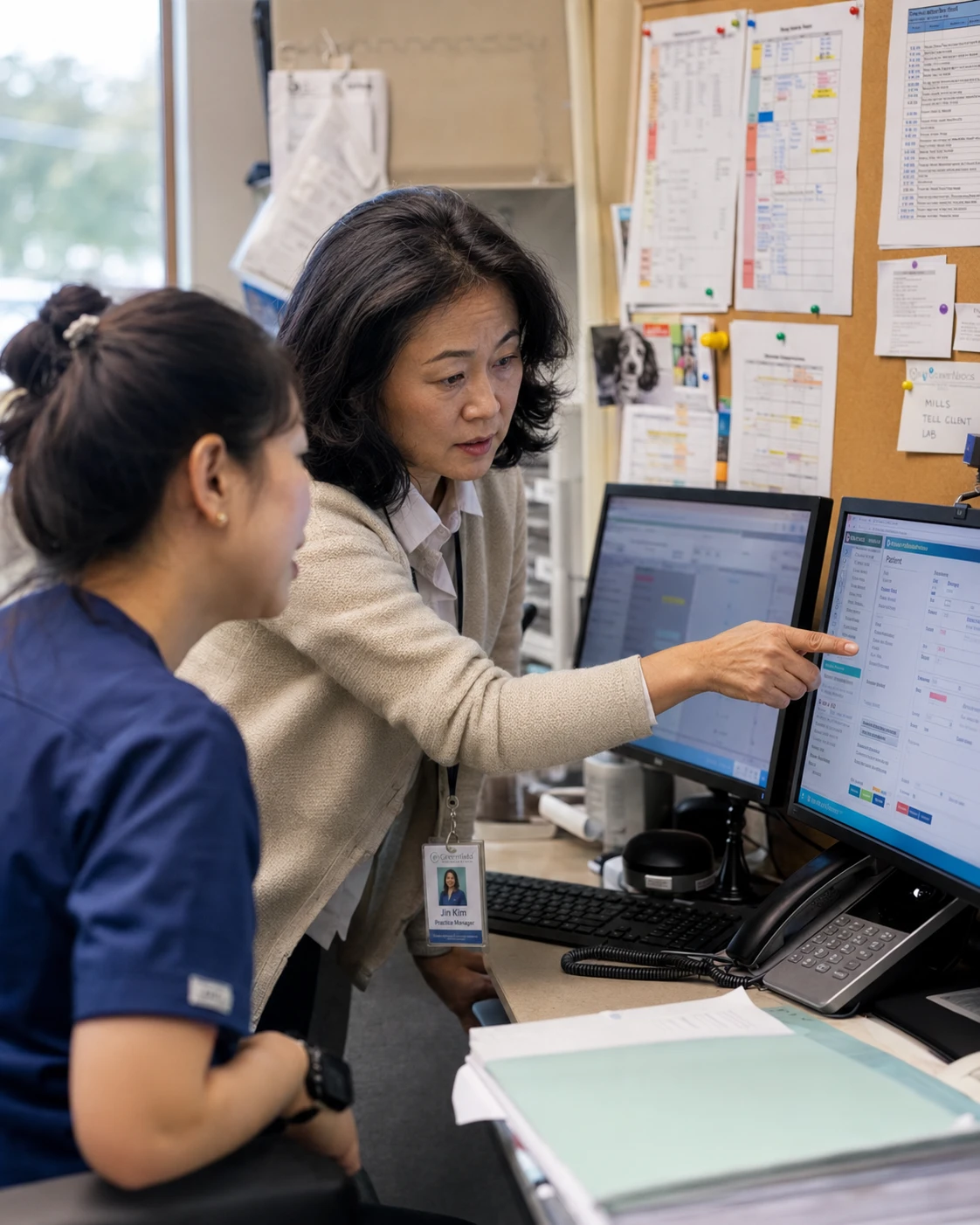 Practice manager checking how vet telemedicine software writes consultation notes back into the patient record